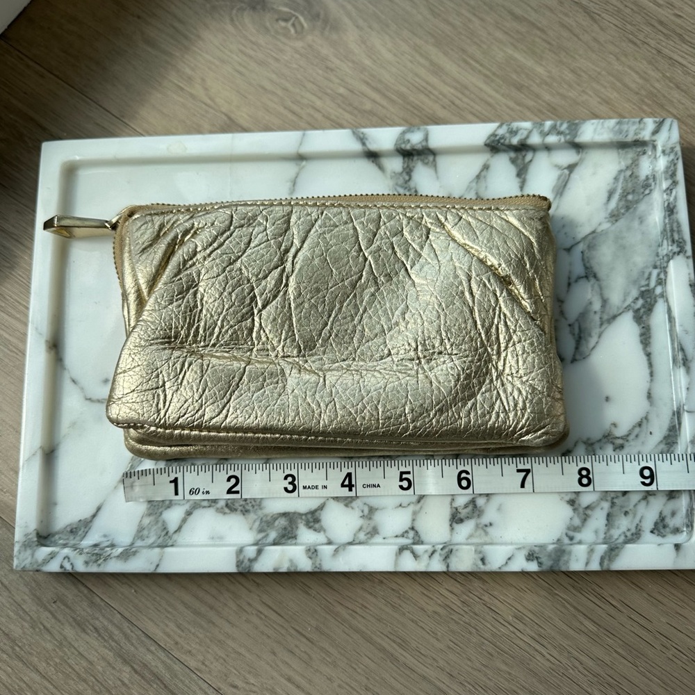 Anthropologie gold leather wallet
